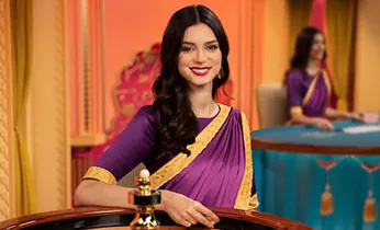 Hình ảnh sòng bạc trực tuyến với bàn Baccarat và người chia bài thật.